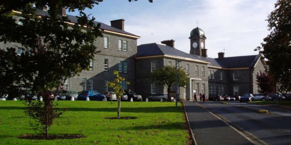 Exterior of the GMIT Mayo Campus, a large grey building with a clock tower