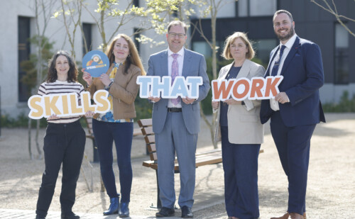 group photo of springboard team with Minister Lawless