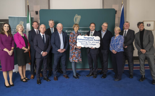 Targeted Enhancement Fund Group photo featureing 12 people posing for the camera, including Minister James Lawless