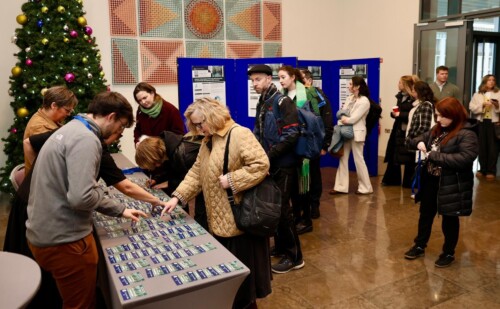 People registering for the Teaching and Learning Conference 2025