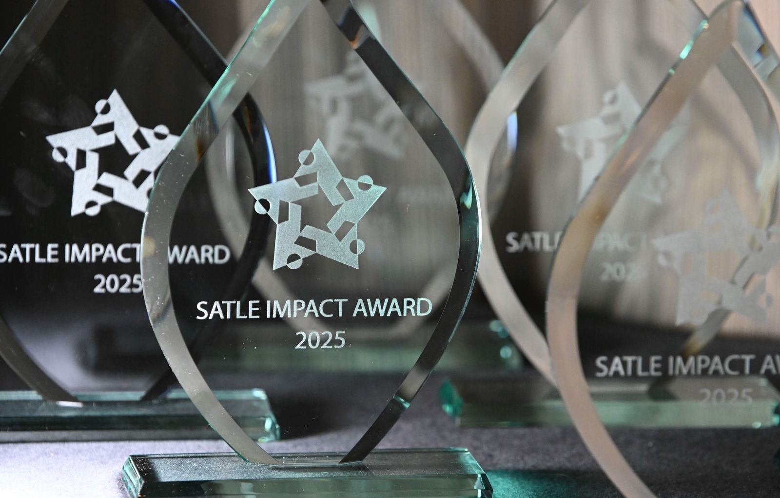 SATLE Impact Award plagues