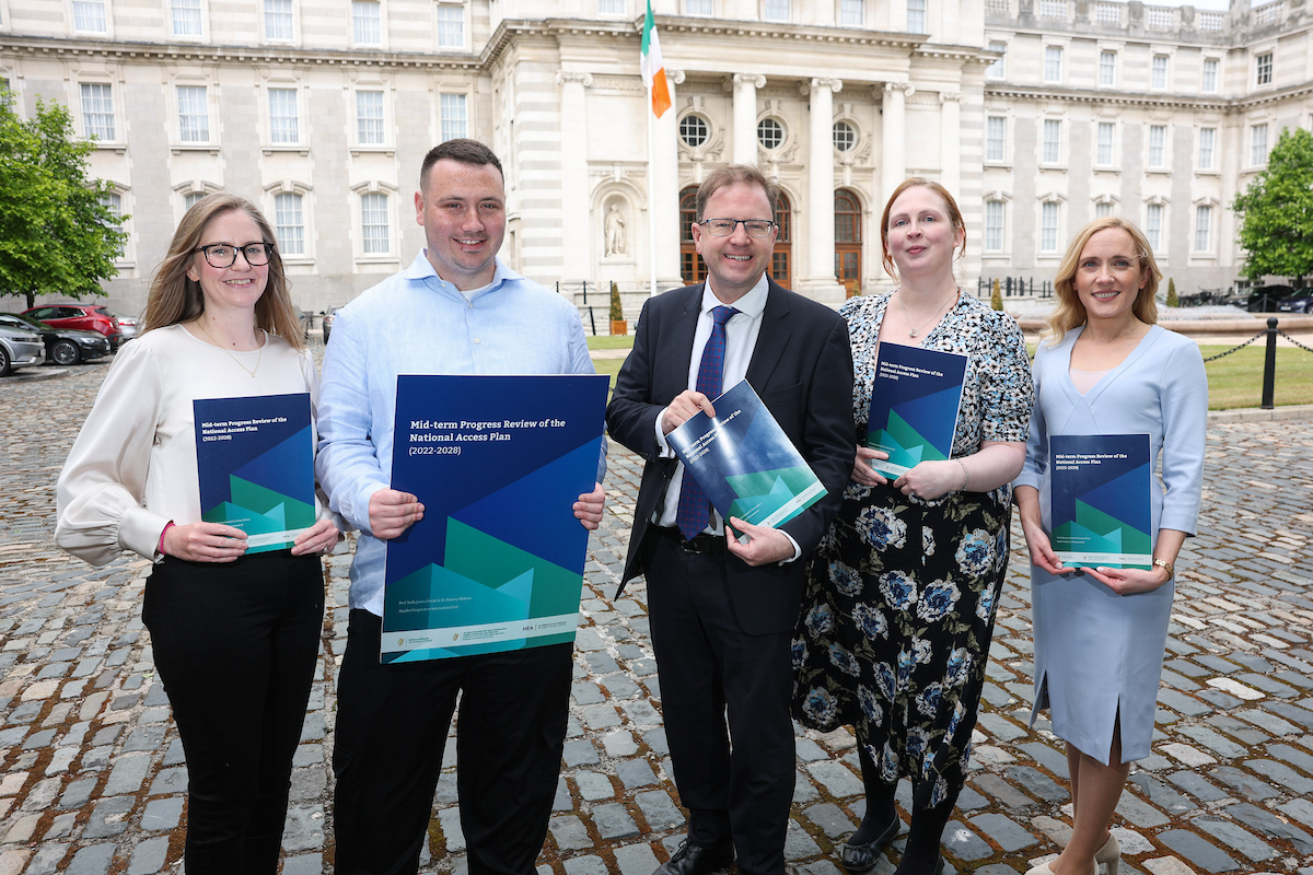 Group of people launching the Mid-term Progress Review of the National Access Plan (2022-2028)