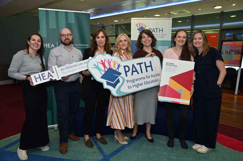 Group holding banners at PATH 2026 event in Croke Park