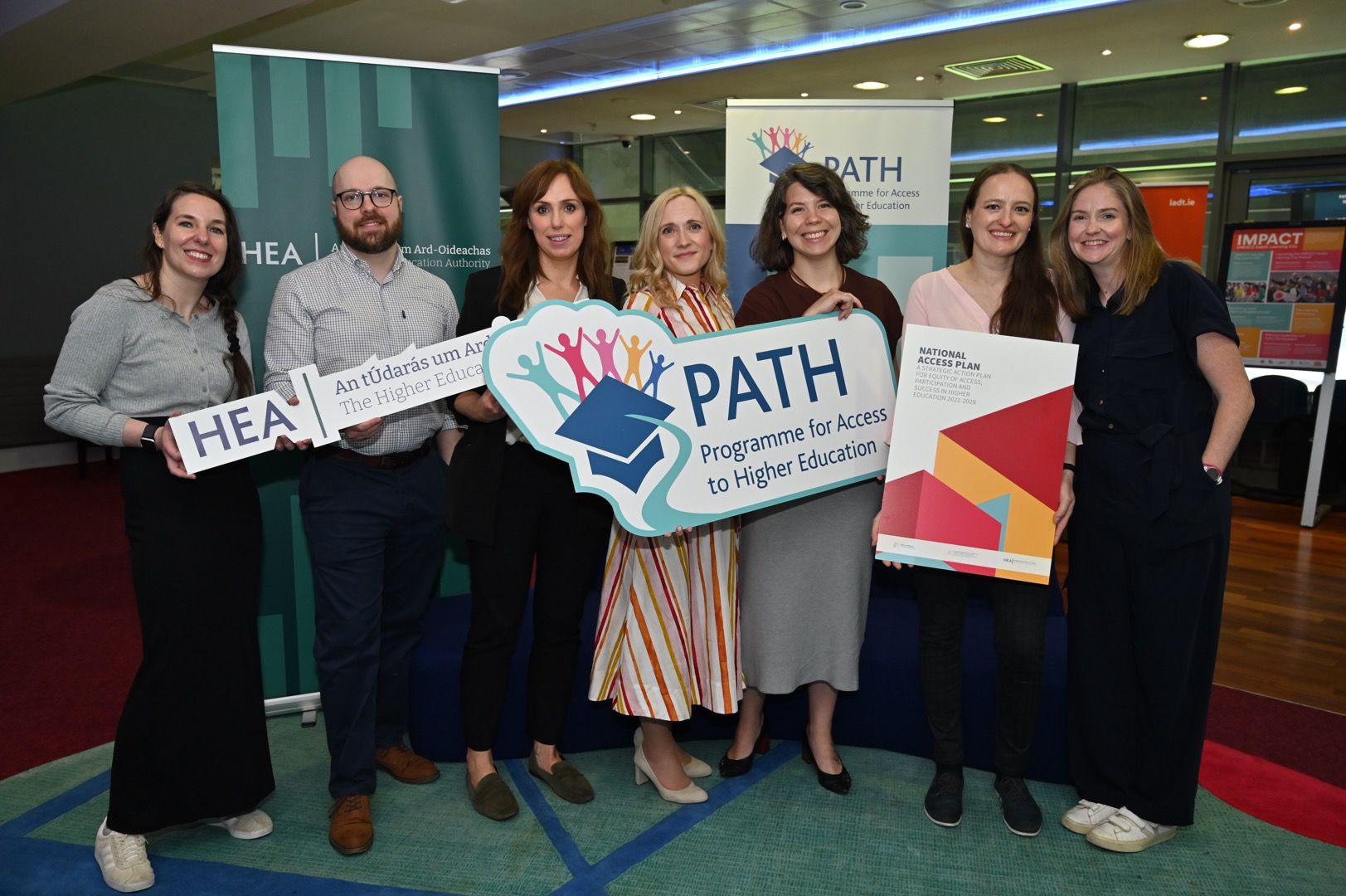 Group holding banners at PATH 2026 event in Croke Park