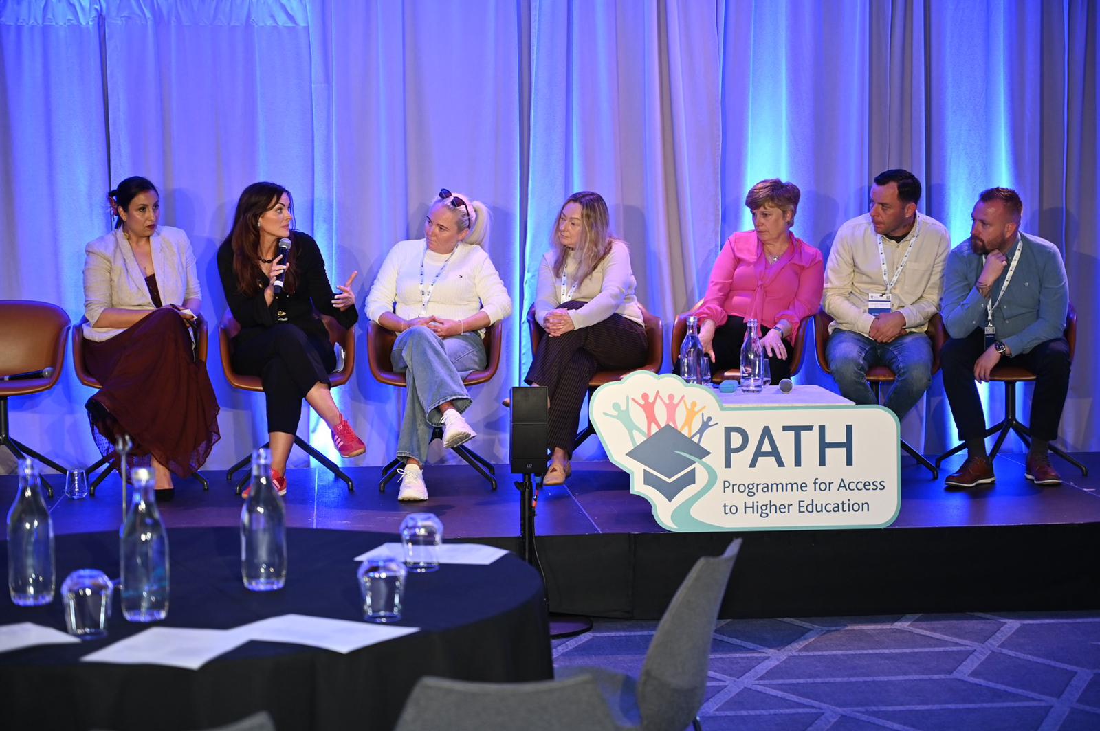Panel on stage at PATH 2026 event
