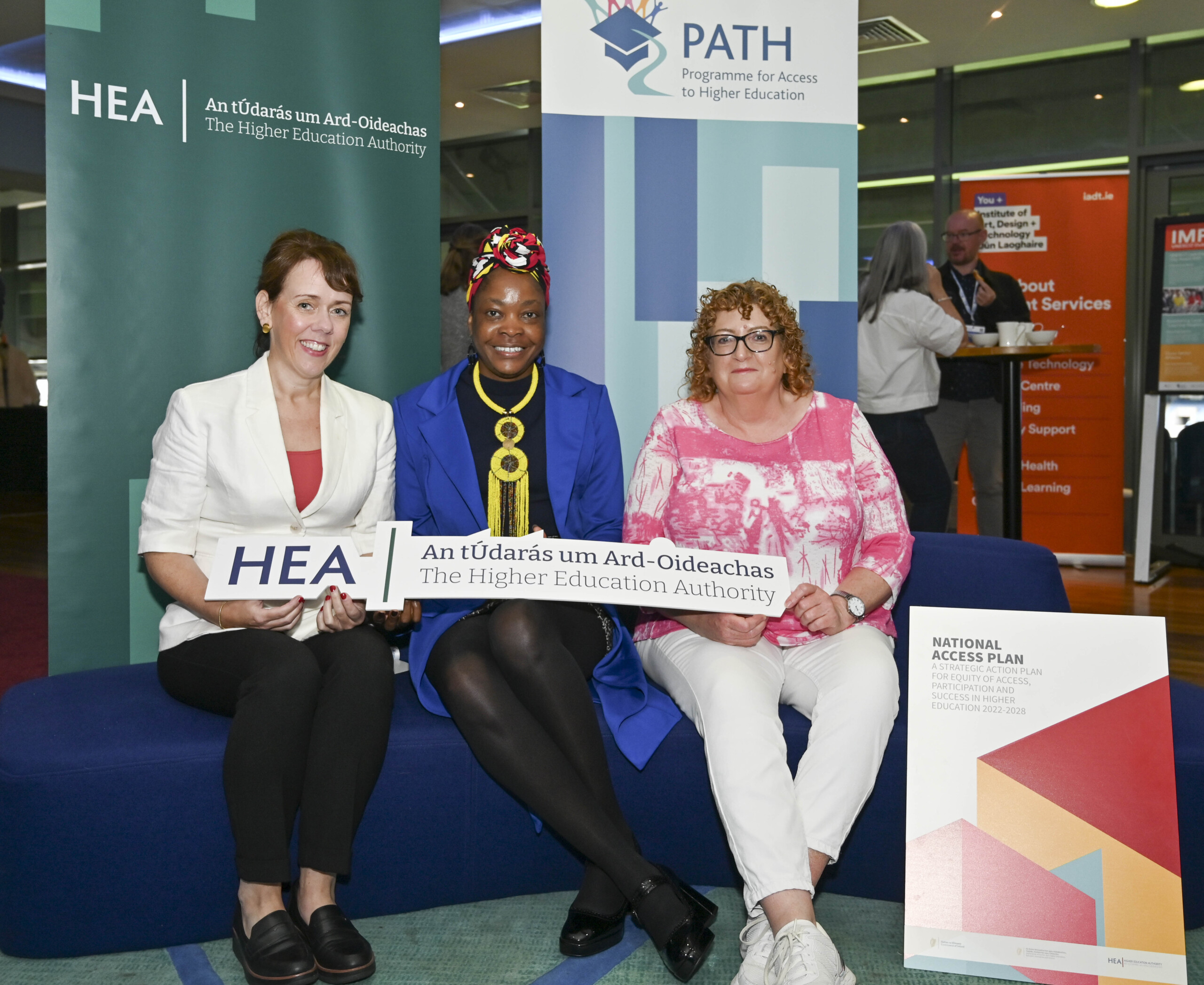 Group of participants holding a HEA banner at the PATH Showcase Event 2026