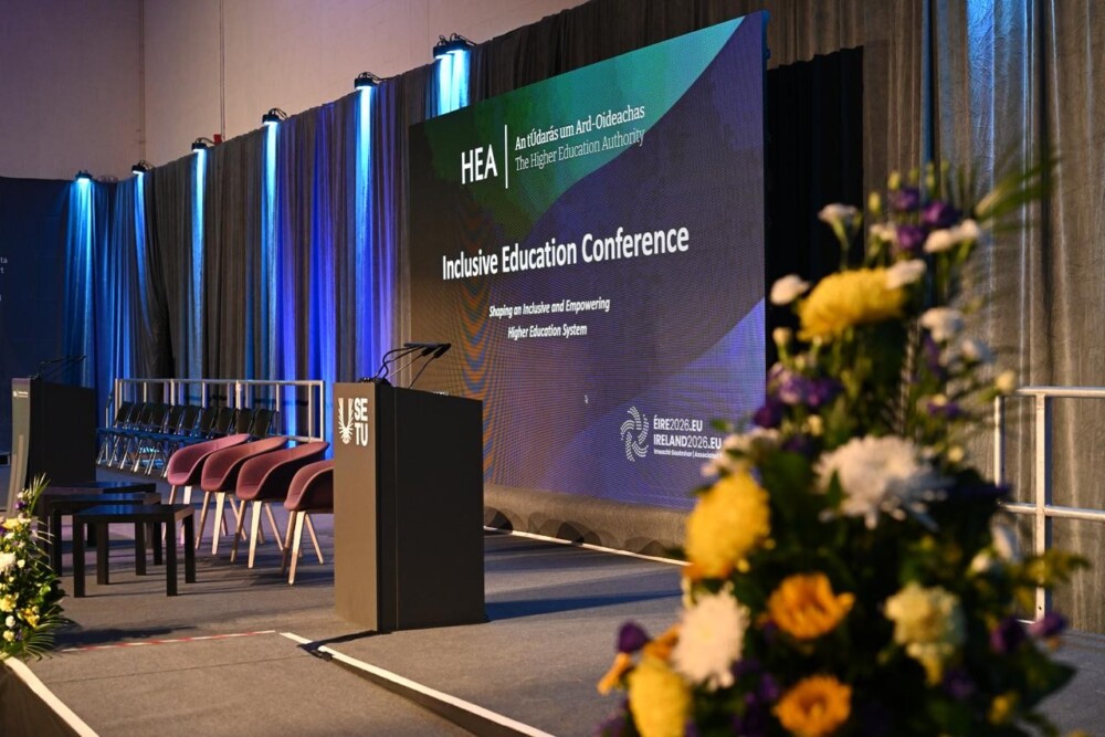 Image of flowers and stage at the HEA Inclusive Education Conference at SETU Carlow, 2026